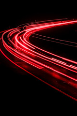 red lines of car lights on black background