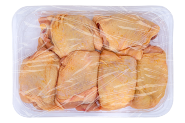 Mockup of packaging of raw chicken meat with a film wrapper isolated on white background