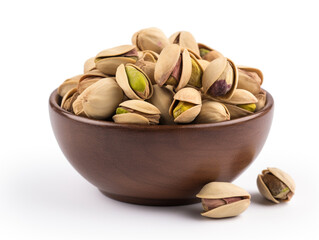pistachio nuts in a bowl isolated on white