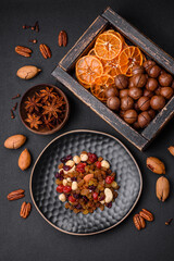 Roasted pecans and macadamia nuts, dried tangerine, dried berries