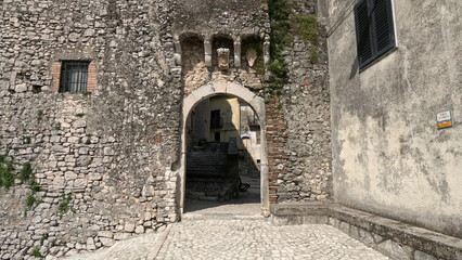 Fototapeta na wymiar Entrance arch in Macchia d'Isernia, a small medieval village in the mountains of Molise, Italy.