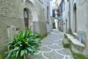 A narrow street of Macchia d'Isernia, a medieval village in the mountains of Molise., Italy.