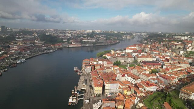 2023 - Excellent aerial view of architecture on the coast of a river in Porto, Portugal on a cloudy day.