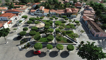 Aerial view of a small town in the northeast of Brazil With beautiful central square. - obrazy, fototapety, plakaty