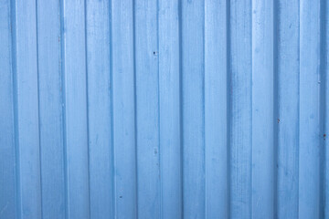 detail of corrugated metal door painted blue