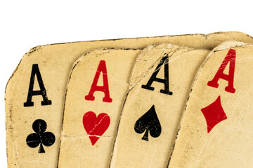 Four old dirty aces poker cards on a transparent isolated background. png