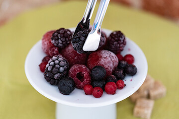 a lot of raspberries and strawberries