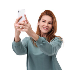 Beautiful woman taking selfie on white background