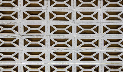 Naklejka premium Figured stone fence in the house as a background. Selective focus
