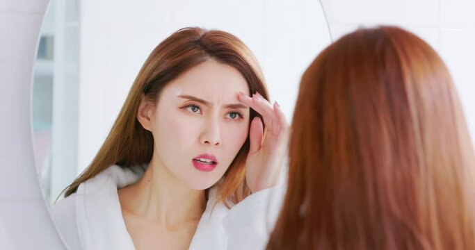 asian woman dislike her eyebrows