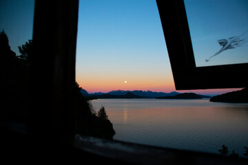 beautiful view from a window of full moon in Patagonia ARGENTINE