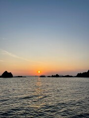Naklejka na ściany i meble sunset and the sea from Phuket Thailand.