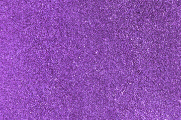 Purple violet glitter texture background.  The concept of New Year, Christmas and all celebrations backgrounds.