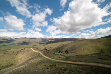 Mountain road in New Zealand landscape