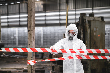 Officers wearing masks and gas masks, shut down areas where chemical spills in industrial plants.