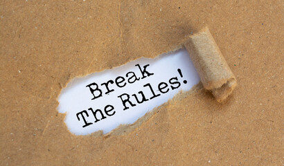 Break The Rules - text on a white background appears behind the torn paper