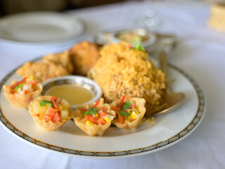 Minced chicken and sweet corn in crispy golden cup or Kratong thong, Thai food .