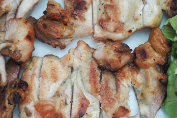  grilled gourmet meats with knife 