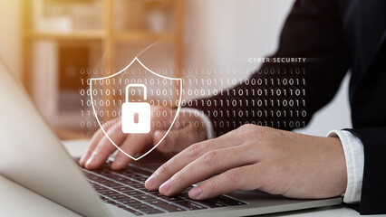 Cyber security concept, businessman using laptop for security and encryption, secure internet...