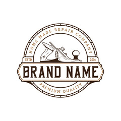 Carpenter logo with saw and hammer axe logo