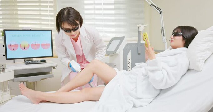 Woman leg laser hair removal
