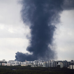 Thick black smoke emanated from a fire in Russia, shrouding Moscow's residential buildings in...