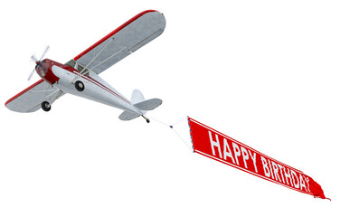 Flying plane with a happy birthday banner