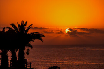 Fototapeta na wymiar Scenic view of beautiful sunset above the ocean golden sunset beach resort