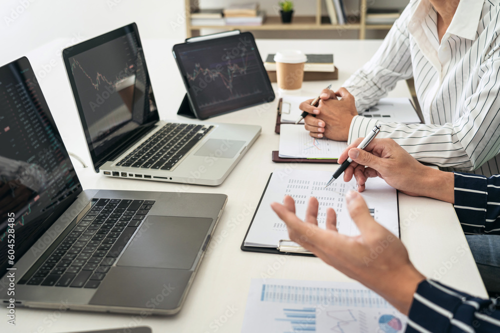 Poster business trader team using laptop to checking stock market onlin