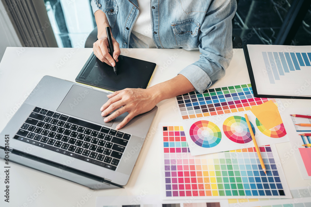 Aufkleber young creative graphic designer working on color selection and d