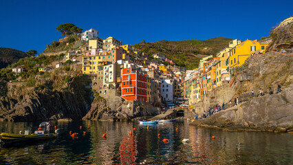 Colorful cityscape of buildings over Mediterranean sea, Europe, Cinque Terre in Italy