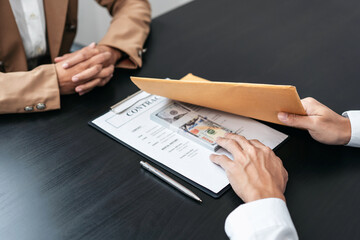 Bribe employer is offer terms to the businessman for signing on