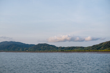 Horizontal view of island in the sea