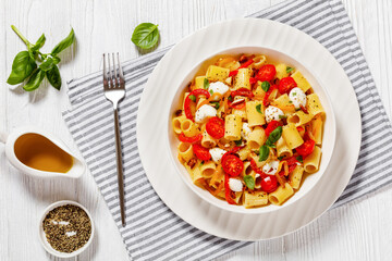 pepper tomato mozzarella pasta salad in bowl