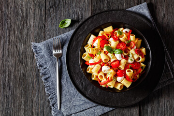 pepper tomato mozzarella pasta salad in bowl