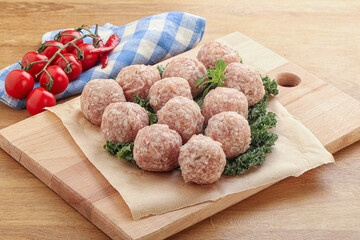 Raw pork meatball for cooking
