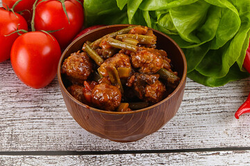 Meatball with vegetables and spices