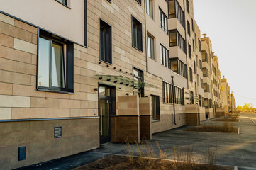 perspective view of a modern residential building at sunset
