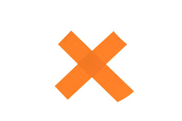 Orange wrong sign, do not paste on the wall, made of scotch tape isolated on white background.