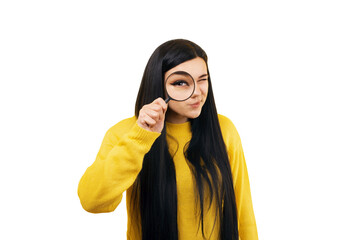 Beautiful woman looking through a magnifying glass, searching concept, isolated on transparent background - 604546649