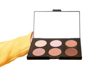 Eyeshadows and correctors, a large palette of make-up artist in hand isolated on transparent background.. Makeup Accessories