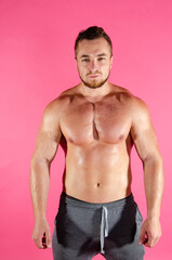 Young handsome guy on a diet. A man with a beautiful athletic body.	
