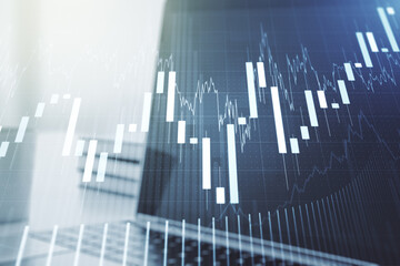 Abstract creative financial graph on modern laptop background, forex and investment concept. Multiexposure