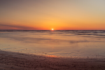 Sunset on Baltic sea shore