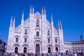 Daytime view of famous Milan Cathedral (Duomo di Milano) on piazza in Milan, Italy