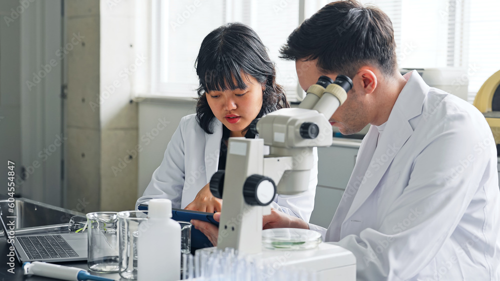 Poster multinational researcher group experimenting in the lab. research and development.