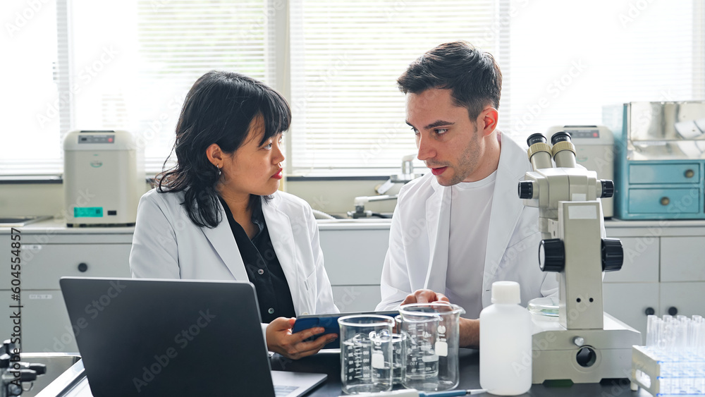 Poster Multinational researcher group experimenting in the lab. Research and Development.
