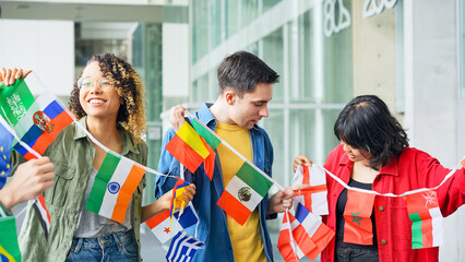 Multinational group with bunting flags. International exchange.