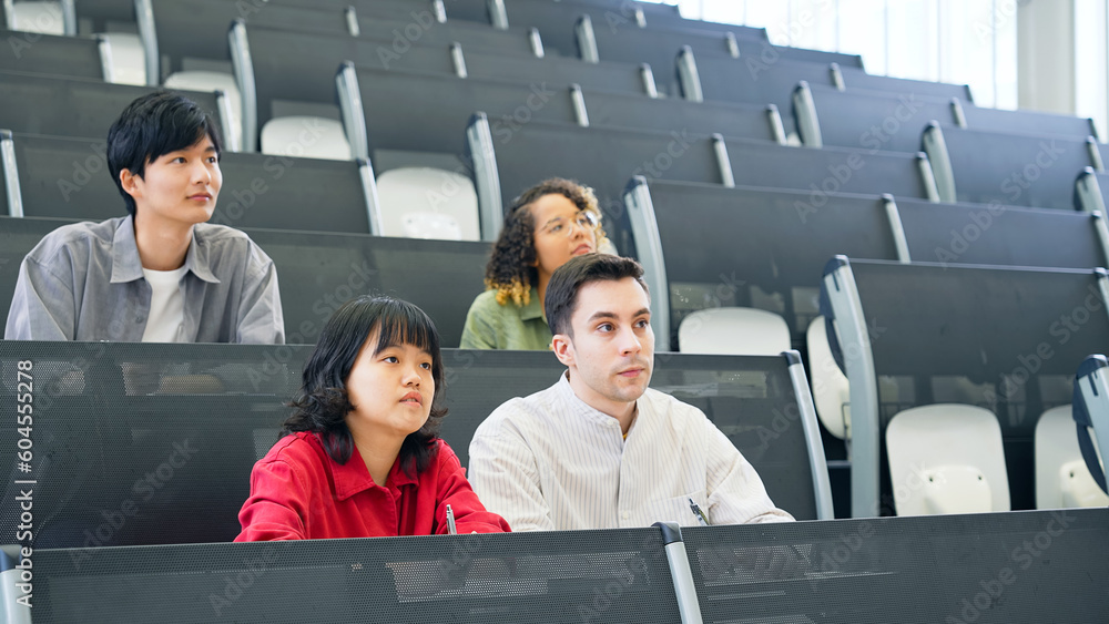 Poster a group of multinational students taking a lecture in an auditorium. international education.