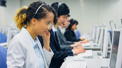 Multinational operator group working in the office. Call center. Customer support staff.